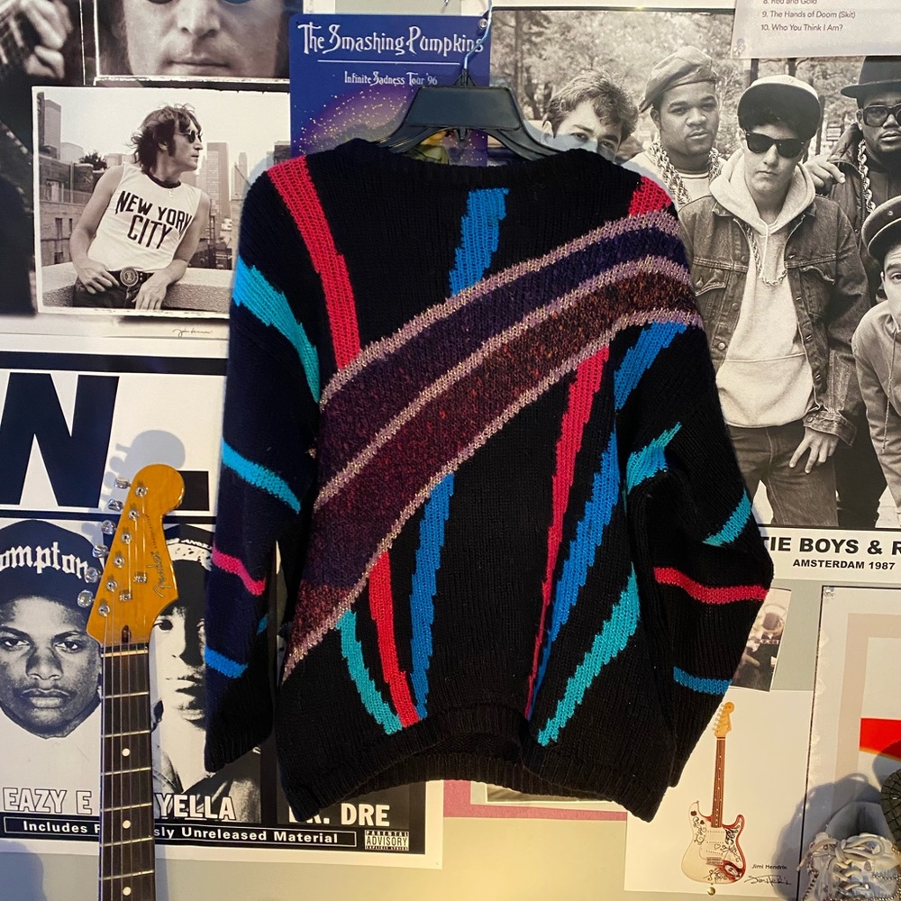 super cute retro sweater gotta love it. size large, fits like a medium!
